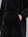 Poche kangourou, tissu noir et poignet du sweat plaid homme Fortress